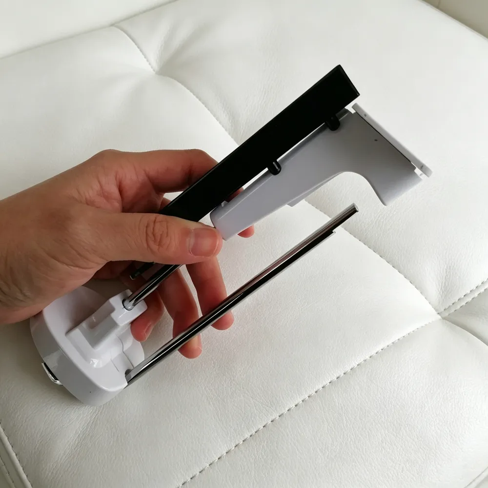 Long strip hook lock detacher used for phone accessory shop pegboard display