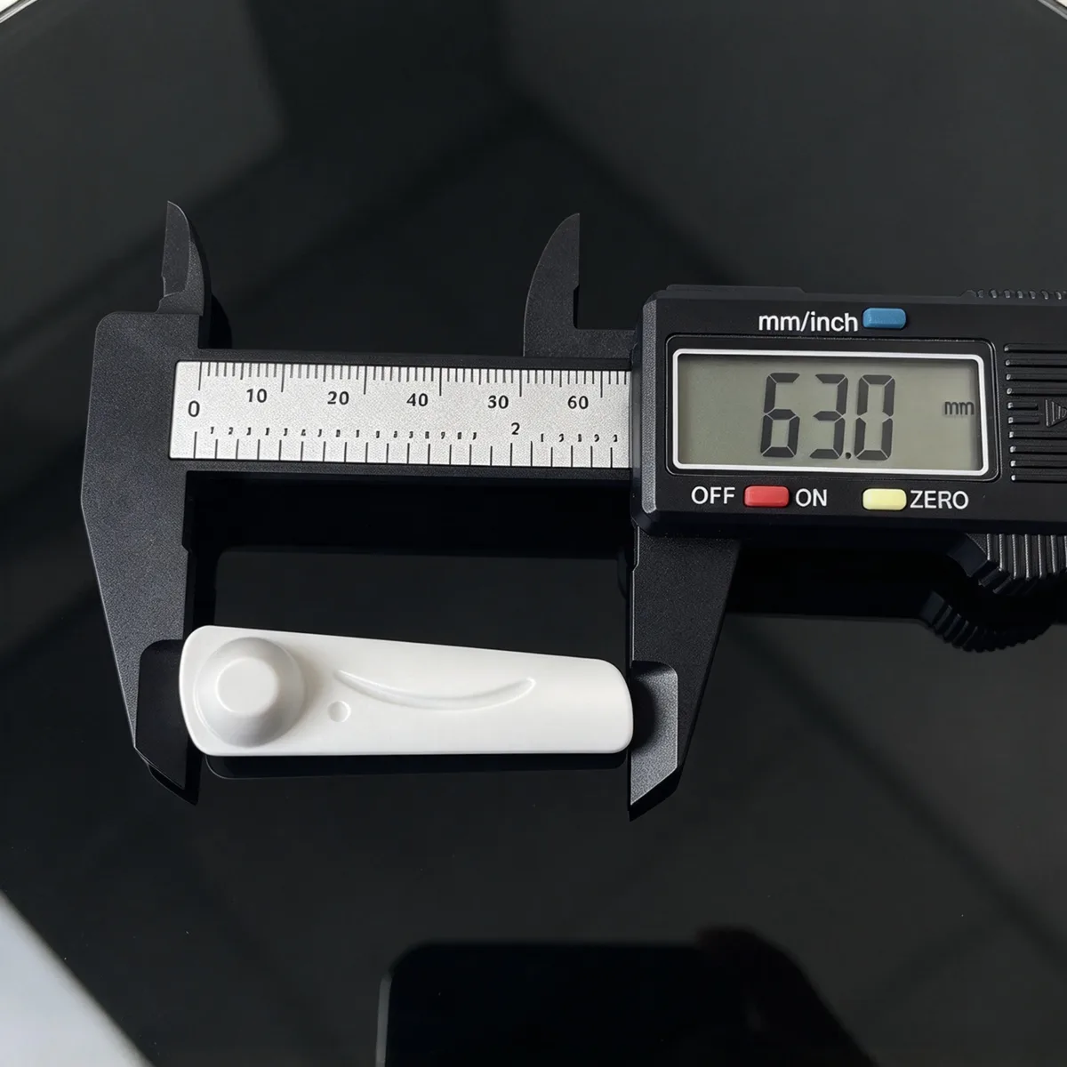 Close-up view of Lionyouge 63mm Hammer AM EAS Hard Tag, 58KHz retail anti-theft hard tag