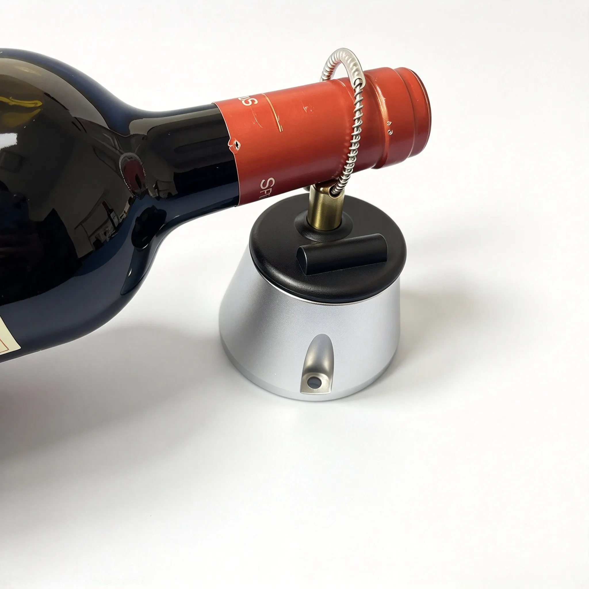 AM security tag mounted on red wine bottle for retail anti-theft